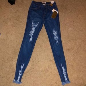 Distressed skinny jeans BRAND NEW. Size 11